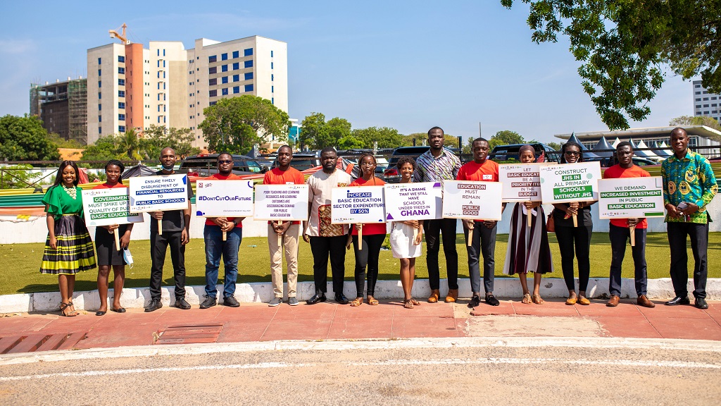 Education Spike Campaign Placard Holding Event